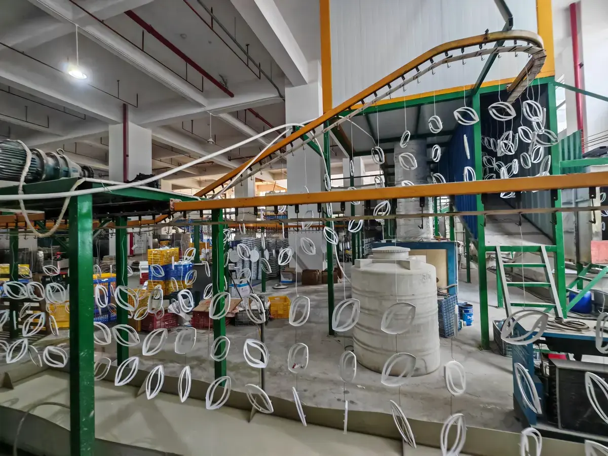 Automated powder-coating and spraying lines