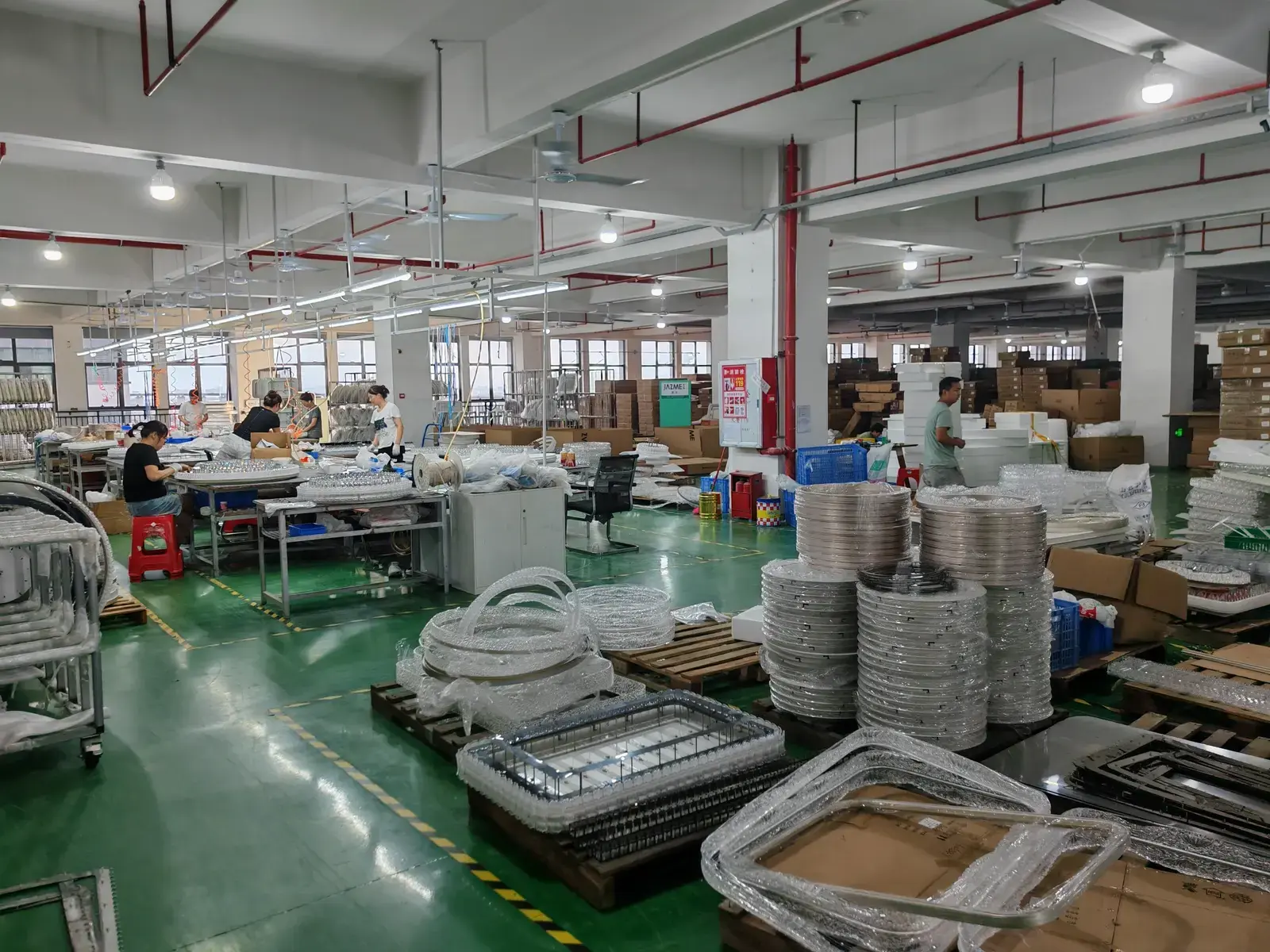Specialists assembling premium chandeliers