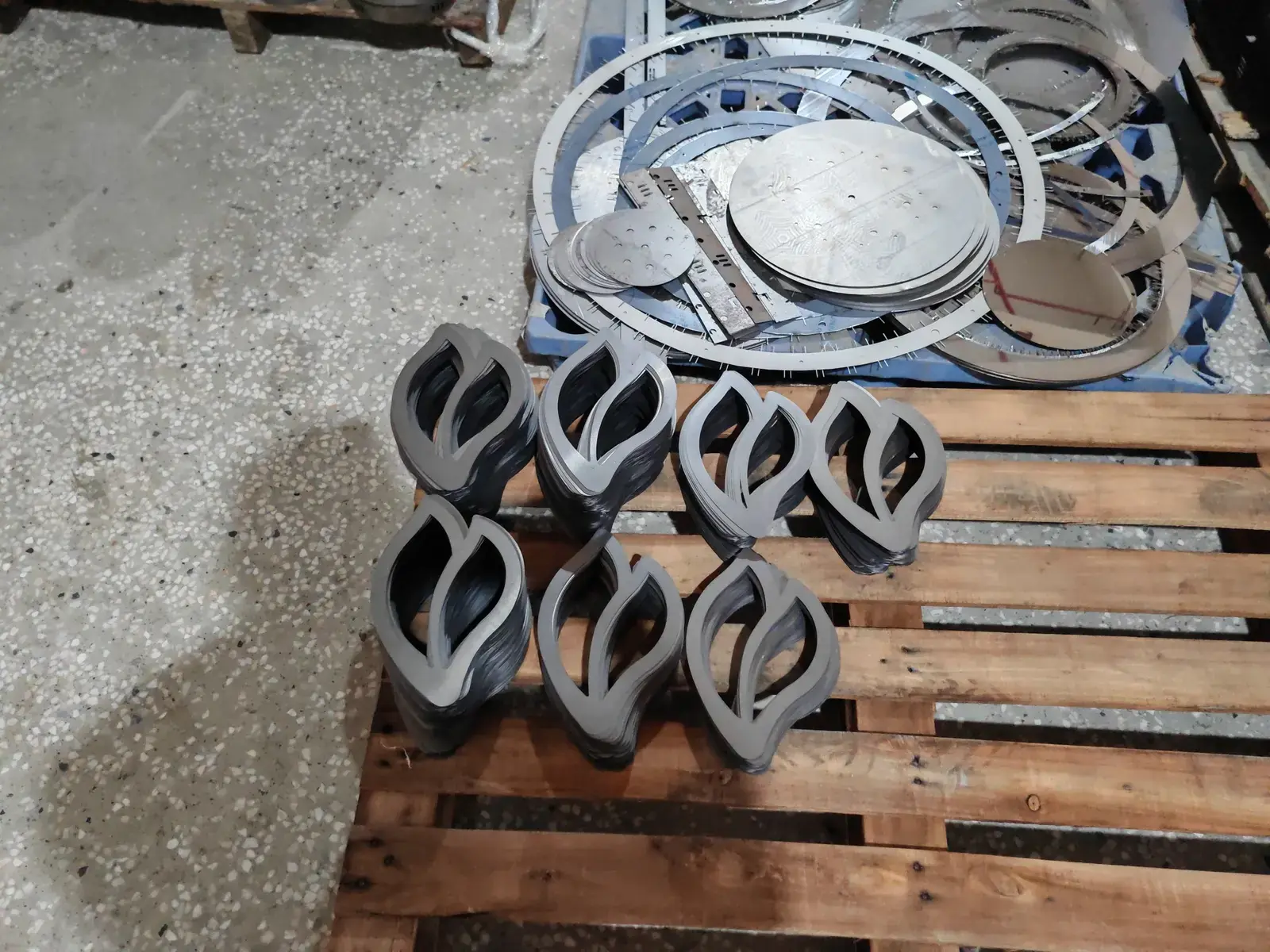 Finished metal lighting components in different shapes and sizes